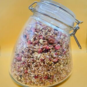 550g high fibre protein boosted berry granola in an eco-friendly packaging - a glass jar
