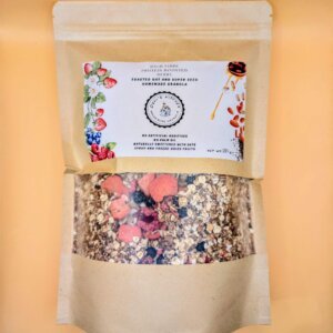 550g high fibre protein boosted berry granola in kraft pouch with clear window packaging