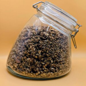 550g high fibre protein boosted dark chocolate granola in an eco-friendly packaging - a glass jar